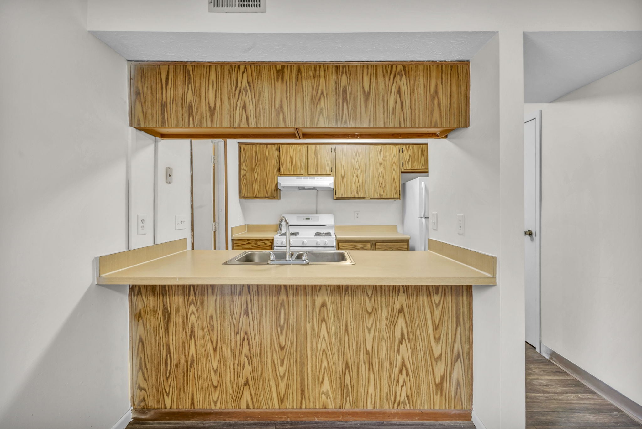 Classic finish kitchen with wood-plank inspired finish 